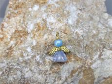 lótuszvirág szoknyás arany színű angyalka világoskék